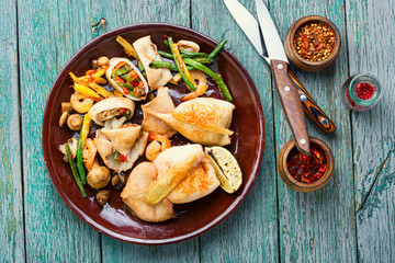 Squid stuffed with vegetables