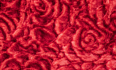 Red knitted texture abstract roses pattern. Valentines day background.