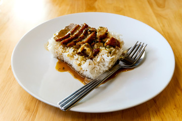 Rice with roast duck are a popular food eaten in Thailand