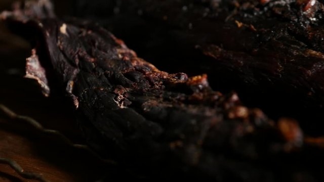 Close-up Gourmet Beef Jerky in the dark