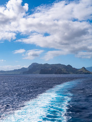 Obraz na płótnie Canvas Cruise ship leaving from Nawiliwili port on Kauai, Hawaii. Kauai is known as the 