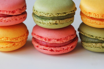 Traditional colorful french macarons are sweet meringue-based confection.