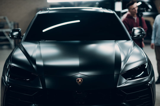 Moscow Russia - February 10, 2019: Lamborghini Urus black sport car. Front view. Sports cars street race.