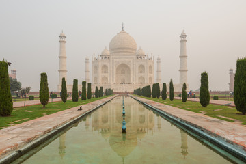 Fototapeta na wymiar Front side of the Taj Mahal in Agra, India, on overcast morning with smog