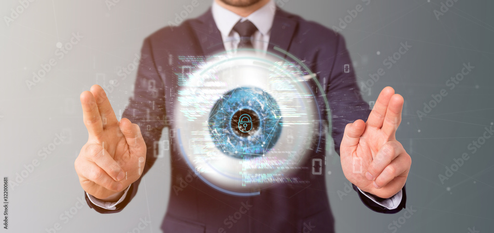 Aufkleber businessman holding a visual recognition eye concept with data - 3d rendering
