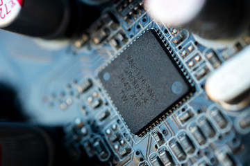 Close up macro shooting computer circuit mainboard integrated elements. Shallow depth of field....