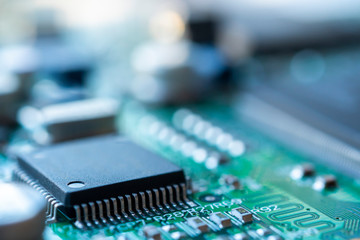 Close up macro shooting computer circuit mainboard integrated elements. Shallow depth of field....