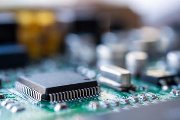 Close up macro shooting computer circuit mainboard integrated elements. Shallow depth of field....