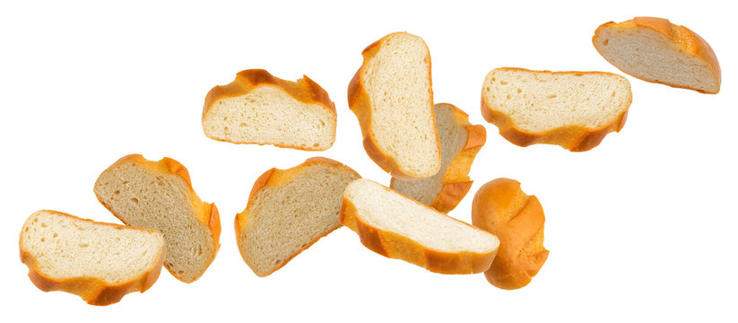 Falling slices of white bread isolated on white background