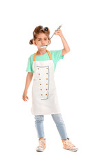 Little housewife with ladle on white background