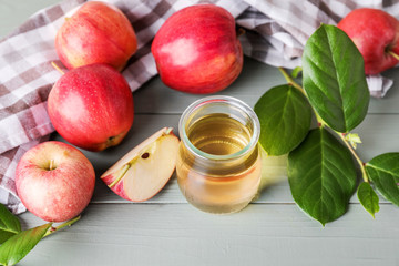 Jar of apple cider vinegar on table