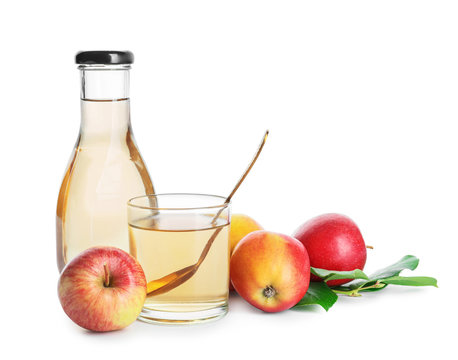 Apple cider vinegar on white background