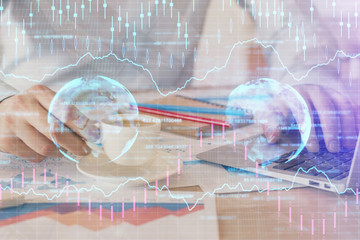 Plakat Forex graph with businessman working on computer in office on background. Concept of hardworking. Double exposure.