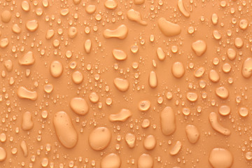 Water drops on color background