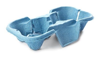 Cardboard eggs holder on white background. Recycling concept