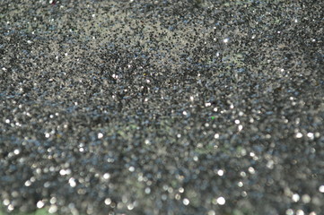 Bokeh of bright glittering sheet with shining sunlight