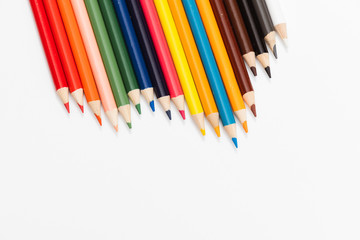 Multi color pencils. the concept of a multinational family and equality in the world.