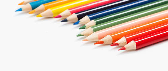 Multi color pencils. the concept of a multinational family and equality in the world.