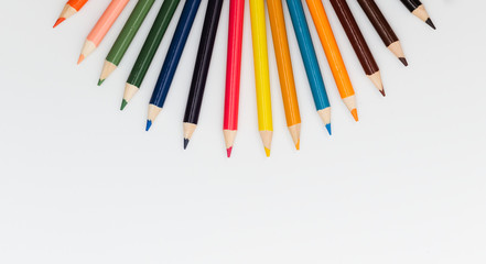 Multi color pencils. the concept of a multinational family and equality in the world.