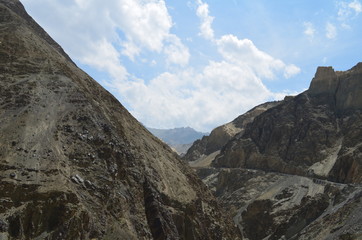 the view of Himalaya mountains on a sunny day under the blue sky in the morning or the evening in Tibet India China the road on high altitudes