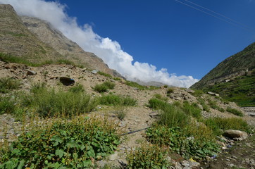 the view of Himalaya mountains on a sunny day under the blue sky in the morning or the evening in Tibet India China the road on high altitudes