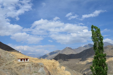 the view of Himalaya mountains on a sunny day under the blue sky in the morning or the evening in Tibet India China the road on high altitudes