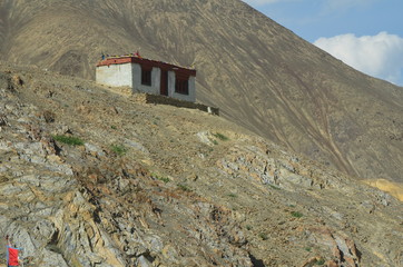 the view of Himalaya mountains on a sunny day under the blue sky in the morning or the evening in Tibet India China the road on high altitudes