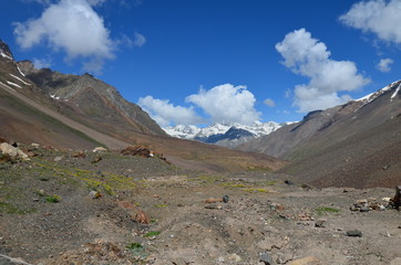 the view of Himalaya mountains on a sunny day under the blue sky in the morning or the evening in Tibet India China the road on high altitudes