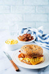 Fried bacon cheese egg salad bagel