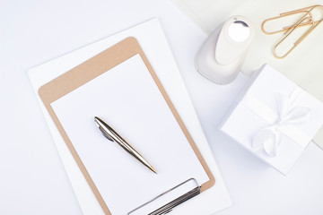 female entrepreneur list making to do list wedding diy flatlay light white flower workspace