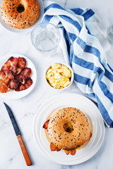Fried bacon cheese egg salad bagel