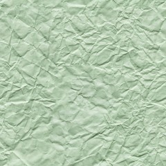 Crumpled green paper background as part of your greeting gift. Seamless texture.