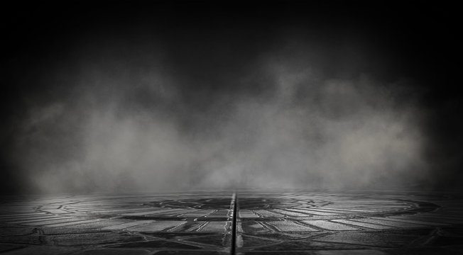 Empty street scene background with abstract spotlights light. Night view of street light reflected on water. Rays through the fog. Smoke, fog, wet asphalt with reflection of lights. 