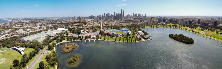 Aerial view of Albert Park lake and city of Melbourne in the background