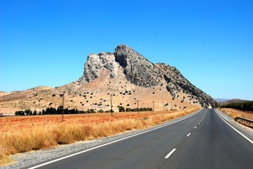 View along the road towards the lovers rock (La Pena de los Enamoradas, Antequera, Spain.