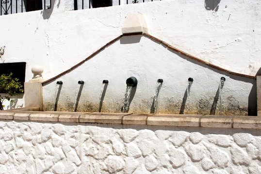 Large drinking fountain in the old town, Mijas, Spain.