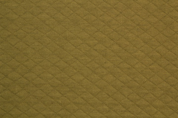 Fototapeta premium Fabric cotton fold, top view. Green textile