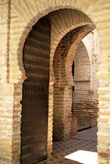 Entrance arches to the mosque (mezquita) within the castle, Jerez de la Frontera, Spain.
