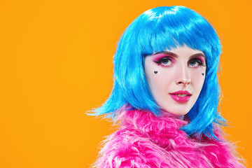 blue wig and pink fur coat