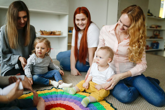 Group of mothers with babies in montessori center