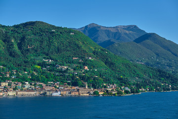 Fototapeta na wymiar Panoramic view of the center of Salo, Italy. Lake Garda, blue sky, mountains