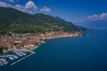 Fototapeta na wymiar Panoramic view of the center of Salo, Italy. Lake Garda, blue sky, mountains