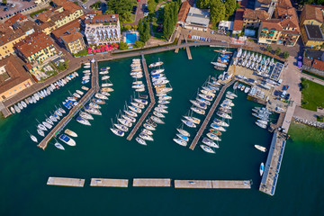 Boat parking city Salo, Italy. Lake Garda