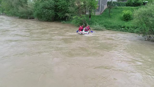 A rescue team is heading to the place where a person fell into the swollen river and dissapeared