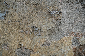 Texture of an old wall covered with paint. Background image of a worn paint coated surface