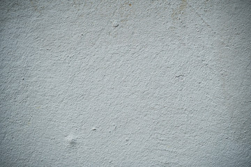 Fototapeta premium Texture of an old wall covered with paint. Background image of a worn paint coated surface