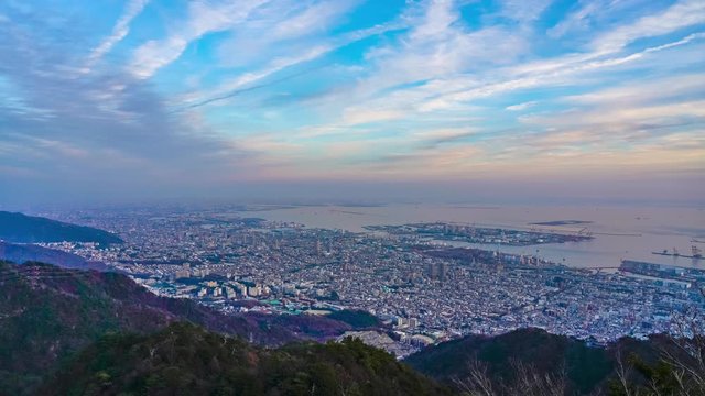 Kobe City panoramic view time-lapse sunset to night, from Mt Maya Kikuseidai park observatory platform in sunny day with colorful sky background, 10 ten million dollar night views. Hyogo Prefecture