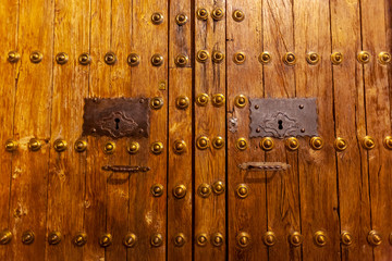 restored wooden door with lock and antique handle