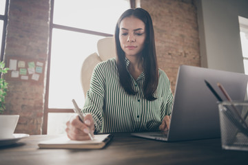 Photo of attractive latin business lady notebook table chatting colleagues writing details new...