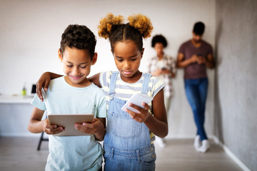 Family sharing there privacy data by using digital devices, phones, tablets